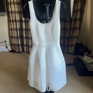 Brand new size 1 MAJE white dress. Never worn with all tags attached.